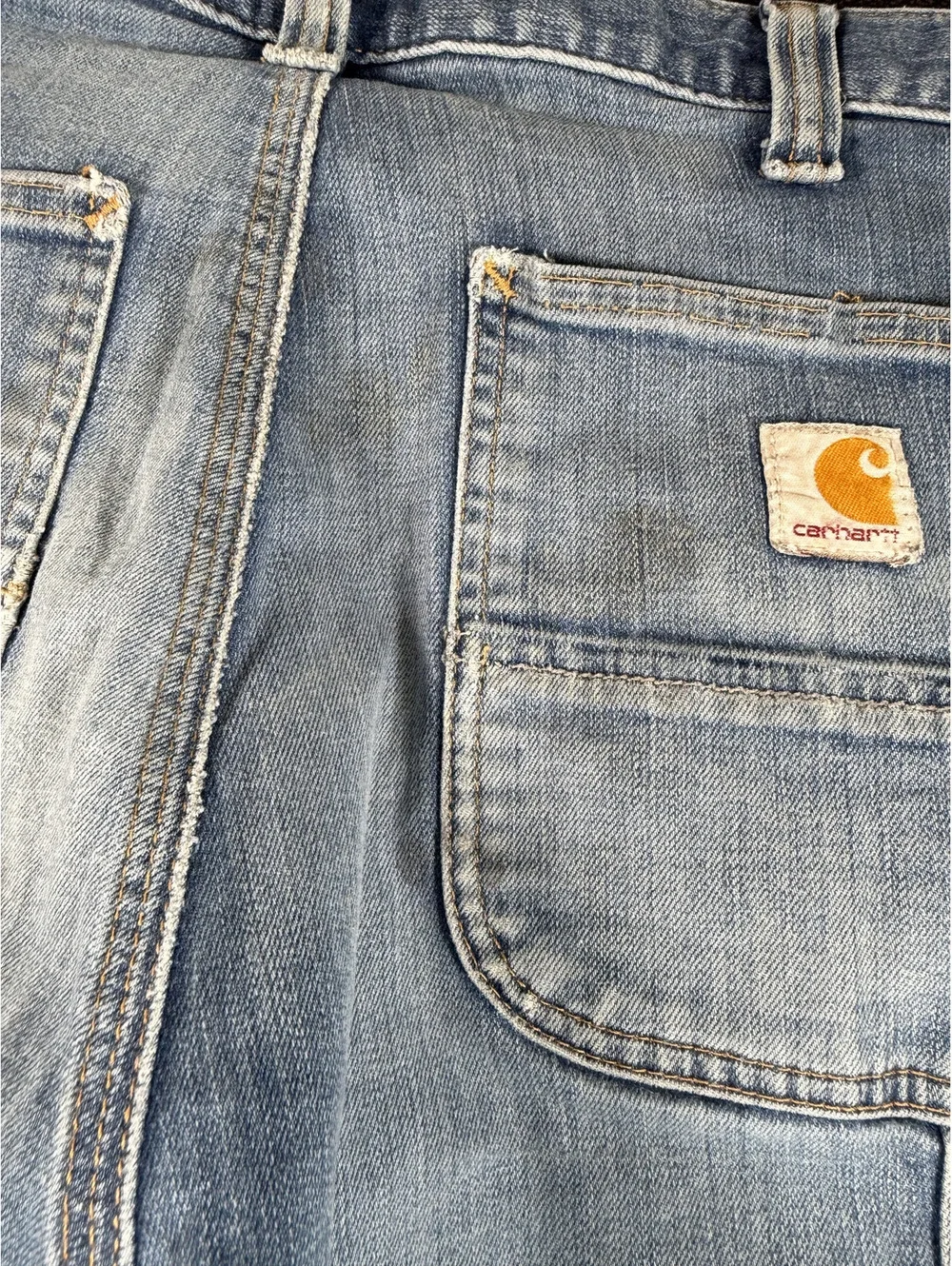 Carhartt Men's Light Blue Denim Work Jeans with Distressed Details, Size 34x34